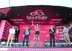 Andreas Leknessund wearing the pink jersey on the Giro d'Italia podium