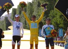 The top 3 on the podium. Alberto Contador (Team Astana), Andy Schleck (Team Saxo bank) and last but definitely not least Lance Armstrong (Team Astana). Photo copyright Fotoreporter Sirotti.