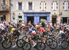 Tour de France peloton passes through French village