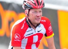 Team RadioShack's Chris Horner crosses the finish line after a rough crash in today's Tour de France stage. Photo Fotoreporter Sirotti.