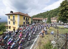 Cyclists racing through Piemonte landscape