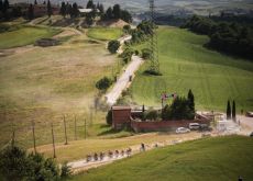 | RCS Sport - LaPresse Cyclists on gravel roads near Sienna