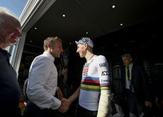 | A.S.O. Emmanuel Macron congratulates Tadej Pogacar