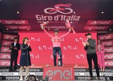 geraint Thomas celebrates his Giro d'Italia lead on the podium