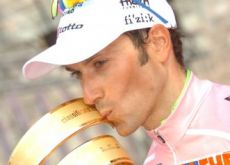 Ivan Basso celebrates that he won the 2010 Giro d'Italia. Photo copyright Fotoreporter Sirotti.