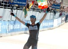 Team Garmin-Cervelo's Johan Van Summeren rides to solo victory in Paris-Roubaix 2011 ahead of Fabian Cancellara (Team Leopard-Trek) and Rabobank's Maarten Tjallingii. Photo Fotoreporter Sirotti.