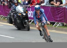 United States' Kristin Armstrong wins Olympic Gold in the women's individual time trial in London ahead of Germany's Judith Arndt and Olga Zabelinskaya of Russia. Photo Fotoreporter Sirotti.