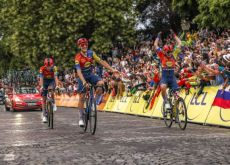 | A.S.O. Lidl-Trek cyclists celebrating with fans