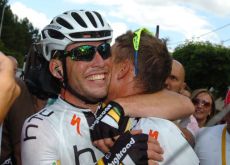 Team HTC-HighRoad's Mark Cavendish hugs teammate Tony Martin after one of his many stage wins in the 2011 Tour de France. Photo Fotoreporter Sirotti.