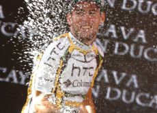 Team HTC-Columbia's Mark Cavendish celebrates his 2nd Vuelta stage win on the podium in Burgos. Photo copyright Fotoreporter Sirotti. Team HTC-Columbia's Mark Cavendish celebrates his 2nd Vuelta stage win on the podium in Burgos. Photo copyright Fotoreporter Sirotti.