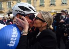 Mathieu van der Poel is kissed by girlfriend Roxanne Bertels