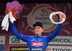 Mathieu van der Poel lifts the Milano-Sanremo trophy