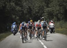Michael Woods and other cyclists in stage 9 of Tour de France 2023