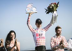 Neilson Powless on the Puy de Dome podium as leader of the best climber competition