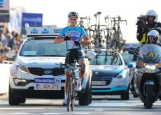 Niki Terpstra of Team Omega Pharma-QuickStep soloes across finish line to win Dwars door Vlaanderen ahead of teammate Sylvain Chavanel and Koen de Kort of Team 1t4i. Photo copyright Tim de Waele