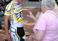 Mark Cavendish listens to British granny give him advise just before he starts time trial warm-up. Photo by Andrew Ward.