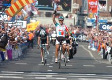 Team Omega Pharma-Lotto's Philippe Gilbert powers to victory in Liege-Bastogne-Liege ahead of Frank Schleck and Andy Schleck of Team Leopard-Trek. Photo Fotoreporter Sirotti.