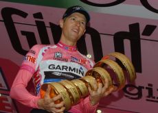 Team Garmin-Barracuda's Ryder Hesjedal wins Giro d'Italia 2012. Ryder on the podium in Milan with the Giro d'Italia trophy. Photo Fotoreporter Sirotti.