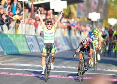 Simon Gerrans of Team GreenEdge sprints to victory in 2012 Milano-San Remo ahead of Fabian Cancellara of Team RadioShack-Nissan and Team Liquigas-Cannondale's Vincenzo Nibali. Photo Fotoreporter Sirotti.
