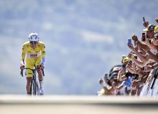 | A.S.O. Tadej Pogacar on his way to victory in the stage 13 time trial of Tour de France