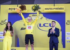 | A.S.O. Tadej Pogacar on the podium as GC leader of Tour de France