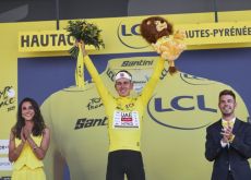 | A.S.O. Tadej Pogacar on the Tour de France podium as race leader