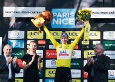 Tadej Pogacar in the yellow jersey on the Paris-Nice podium