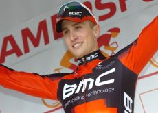 Taylor Phinney (Team BMC Racing) celebrates his prologue victory on the podium. Photo Fotoreporter Sirotti.