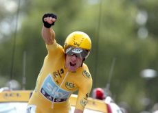 Team Sky Procycling's Bradley Wiggins powers to victory in stage 19 individual time trial of the 2012 Tour de France and increases overall Tour de France lead ahead of teammate Christopher Froome and Vincenzo Nibali of Team Liquigas-Cannondale. Photo Fotoreporter Sirotti.