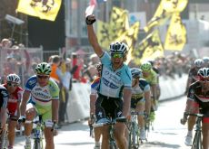 Tom Boonen of Team Omega Pharma-QuickStep powers to victory in Gent-Wevelgem 2012 ahead of Peter Sagan of Team Liquigas-Cannondale and Matti Breschel from Team Rabobank. Photo Fotoreporter Sirotti.