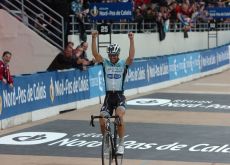 Team Omega Pharma-QuickStep's Tom Boonen powers to solo victory in Paris-Roubaix 2012 ahead of Sebastien Turgot of Team Europcar and Team BMC Racing's Alessandro Ballan. Photo Fotoreporter Sirotti.