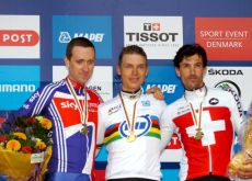 Germany's Tony Martin, Bradley Wiggins (Great Britain) and Fabian Cancellara of Switzerland on the podium in Copenhagen, Denmark.