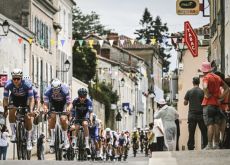 Tour de France riders received by spectators in French village