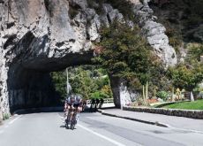 Cyclists exit tunnel in Paris-Nice race