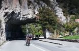 Cyclists exit tunnel in Paris-Nice race